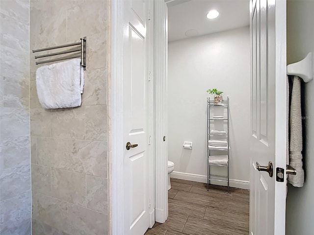 3334 Purple Martin Dr Unit 212, Punta Gorda, FL 33950 - full bathroom featuring toilet, baseboards, and recessed lighting
