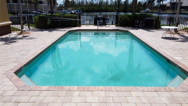 3334 Purple Martin Dr Unit 212, Punta Gorda, FL 33950 - community pool featuring a patio area