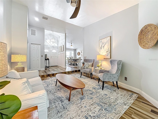 66 Bay Woods Dr, Safety Harbor, FL 34695 - living area featuring a ceiling fan, wood finished floors, and baseboards