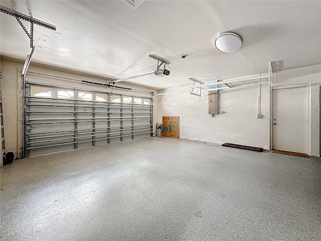 66 Bay Woods Dr, Safety Harbor, FL 34695 - garage featuring electric panel and a garage door opener