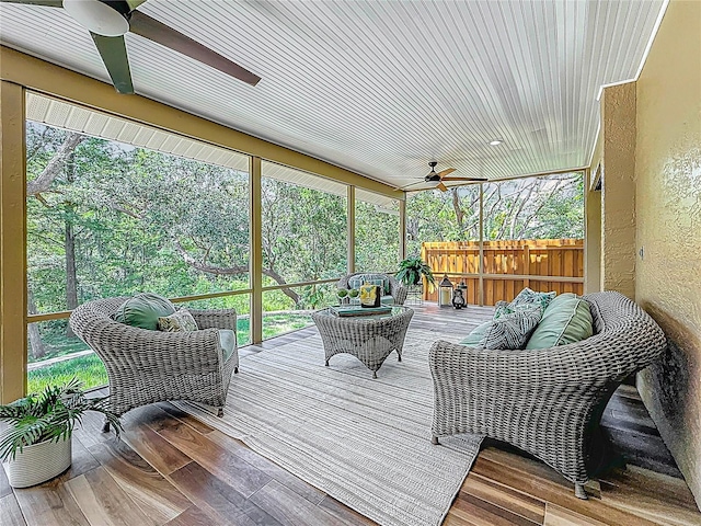 66 Bay Woods Dr, Safety Harbor, FL 34695 - sunroom with a ceiling fan and outdoor lounge area
