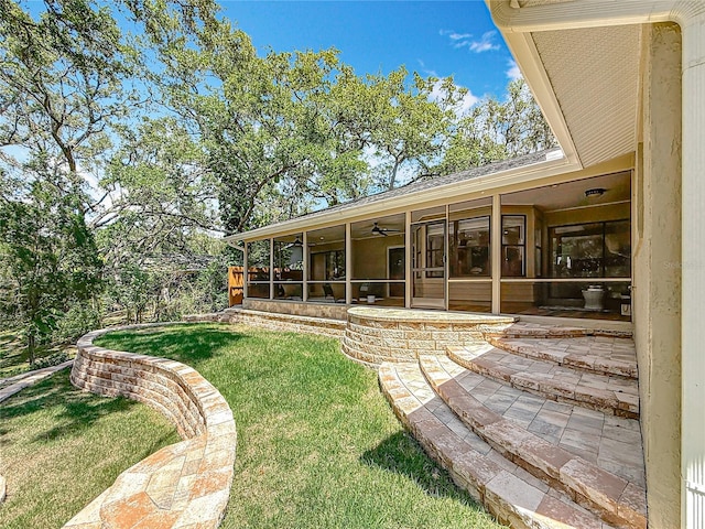 66 Bay Woods Dr, Safety Harbor, FL 34695 - view of grassy yard with a sunroom, ceiling fan, and a patio