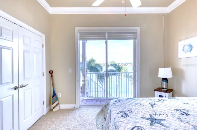 514 Harbor Dr N, Indian Rocks Beach, FL 33785 - bedroom featuring ornamental molding, access to outside, carpet floors, baseboards, and ceiling fan