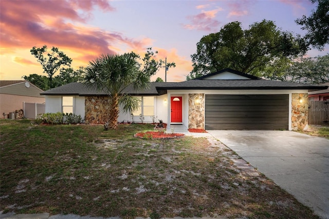 622 Cedar Grove Dr, Brandon, FL 33511 - single story home featuring stone siding, driveway, an attached garage, and stucco siding
