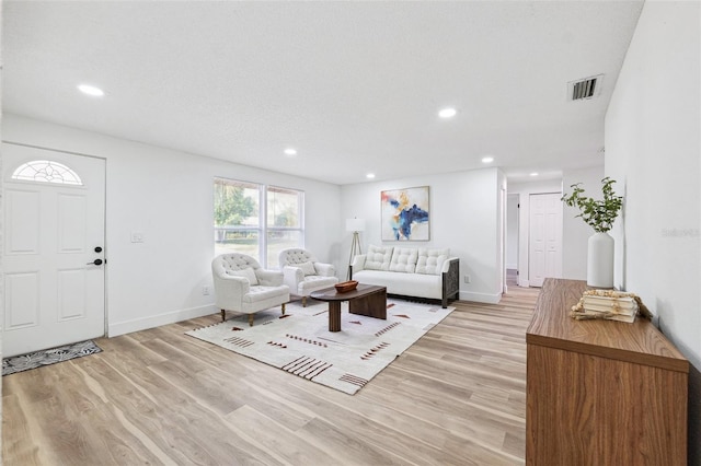 622 Cedar Grove Dr, Brandon, FL 33511 - living room with recessed lighting, light wood-style flooring, and baseboards