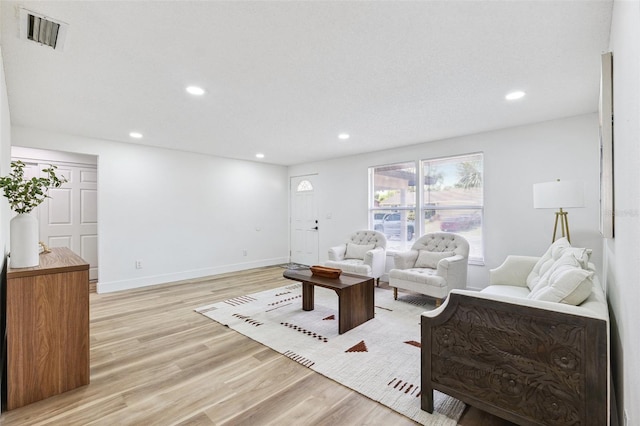 622 Cedar Grove Dr, Brandon, FL 33511 - living area featuring light wood-style flooring, recessed lighting, and baseboards