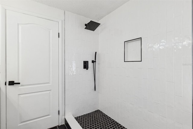 622 Cedar Grove Dr, Brandon, FL 33511 - full bathroom with tiled shower and a textured ceiling