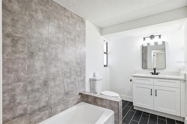 622 Cedar Grove Dr, Brandon, FL 33511 - full bath featuring a tub to relax in, a textured ceiling, vanity, and tile patterned floors