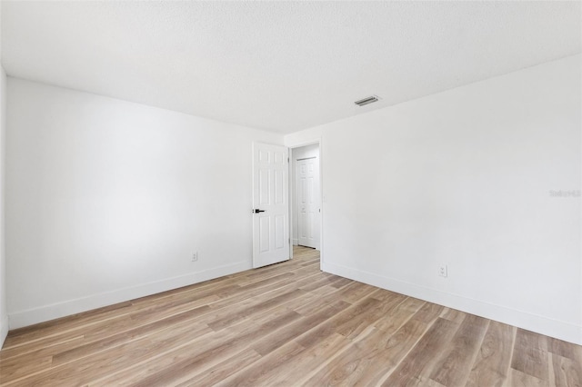 622 Cedar Grove Dr, Brandon, FL 33511 - spare room featuring light wood-type flooring and baseboards