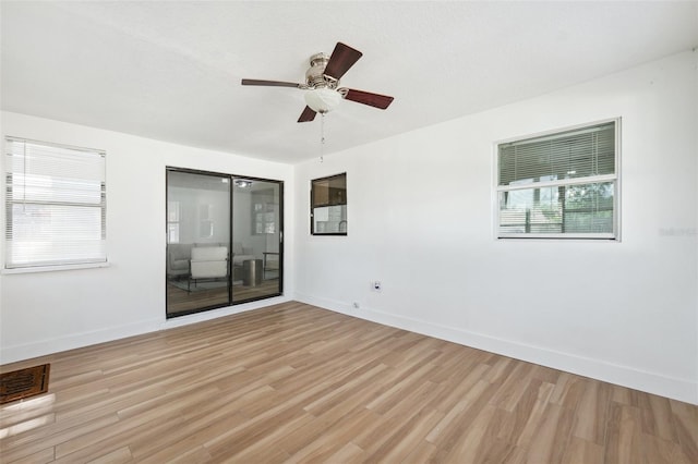 622 Cedar Grove Dr, Brandon, FL 33511 - empty room with light wood-style floors, a ceiling fan, and baseboards