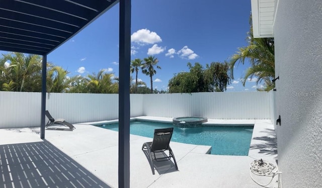 14510 Mj Rd, Myakka City, FL 34251 - view of swimming pool featuring a fenced backyard, a patio area, and a pool with connected hot tub