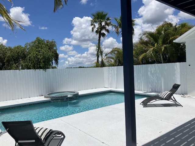 14510 Mj Rd, Myakka City, FL 34251 - view of swimming pool featuring a patio and a pool with connected hot tub