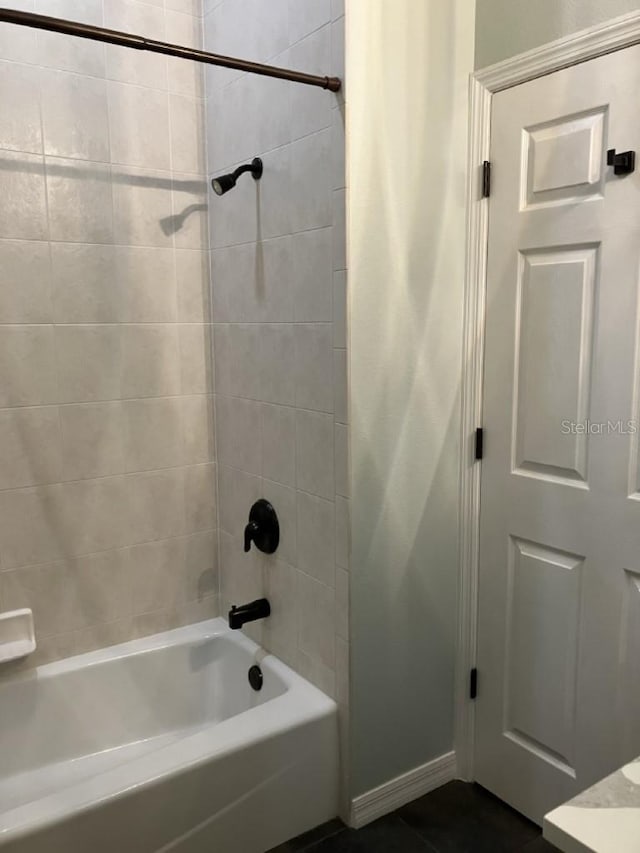 14510 Mj Rd, Myakka City, FL 34251 - full bathroom featuring shower / bath combo and tile patterned floors