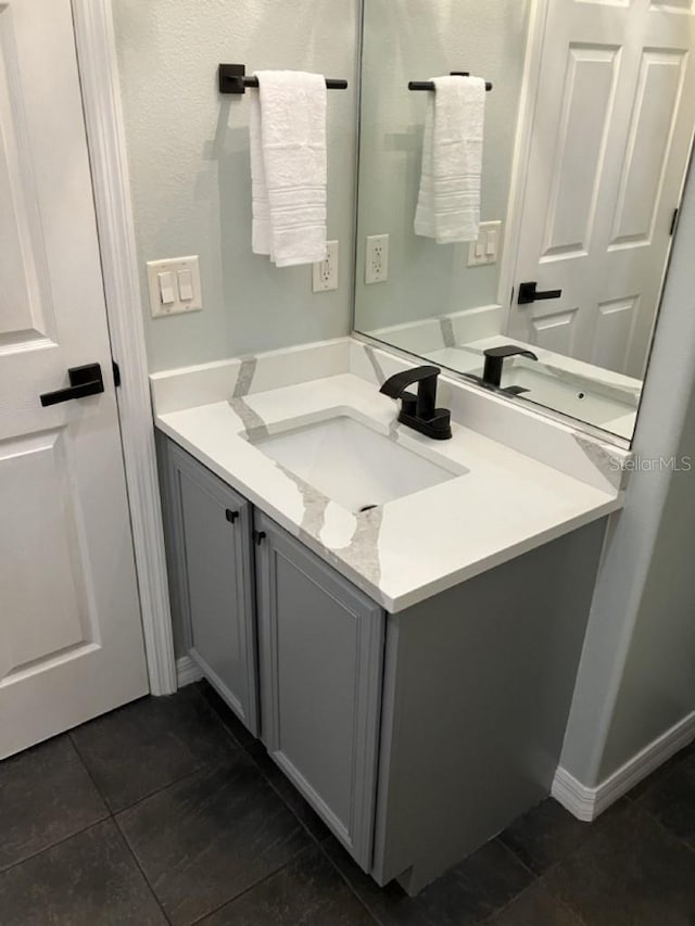 14510 Mj Rd, Myakka City, FL 34251 - bathroom with vanity and tile patterned floors