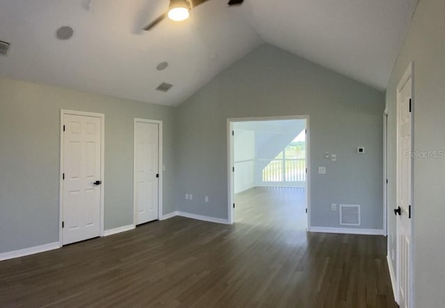 14510 Mj Rd, Myakka City, FL 34251 - unfurnished room featuring ceiling fan, dark wood finished floors, vaulted ceiling, and baseboards