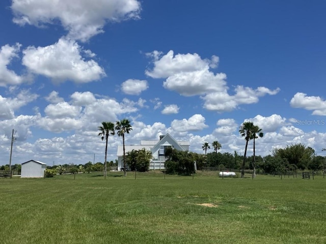 14510 Mj Rd, Myakka City, FL 34251 - view of green lawn featuring an outdoor structure