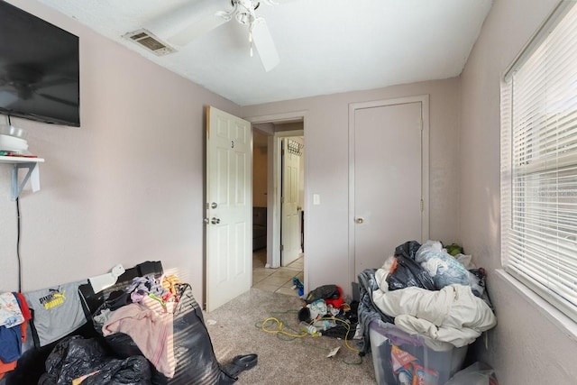 1224 S Delaware Ave, Deland, FL 32720 - unfurnished bedroom with ceiling fan and light colored carpet