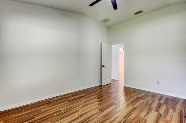 5435 Birchwood Rd, Spring Hill, FL 34608 - spare room featuring ceiling fan, wood finished floors, and baseboards