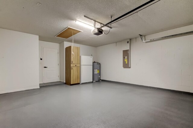 5435 Birchwood Rd, Spring Hill, FL 34608 - garage featuring freestanding refrigerator, electric panel, water heater, a garage door opener, and baseboards