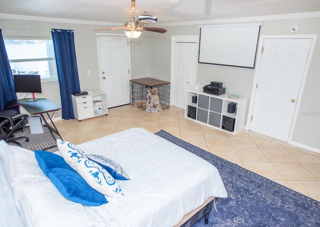 489 Fox Run Trl, Apollo Beach, FL 33572 - bedroom with light tile patterned floors, crown molding, baseboards, and ceiling fan