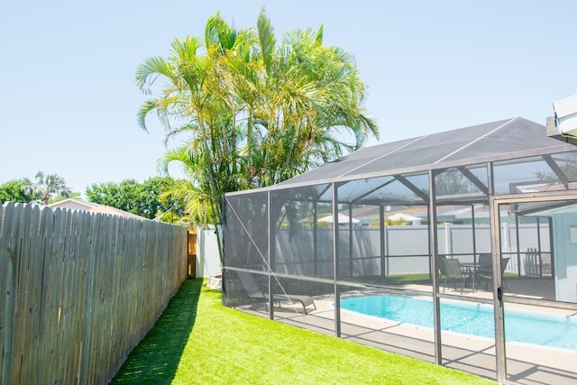 489 Fox Run Trl, Apollo Beach, FL 33572 - view of swimming pool with glass enclosure and a patio
