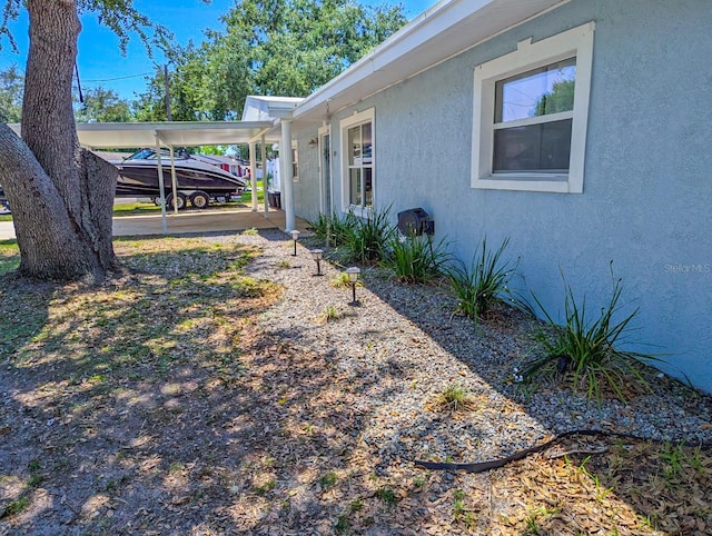 489 Fox Run Trl, Apollo Beach, FL 33572 - view of yard featuring a carport