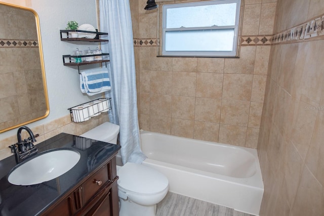489 Fox Run Trl, Apollo Beach, FL 33572 - full bathroom featuring vanity, shower / bath combo, and toilet