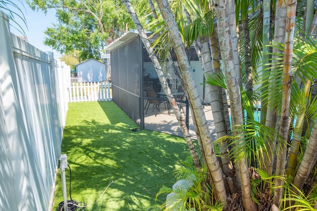 489 Fox Run Trl, Apollo Beach, FL 33572 - view of yard featuring a sunroom