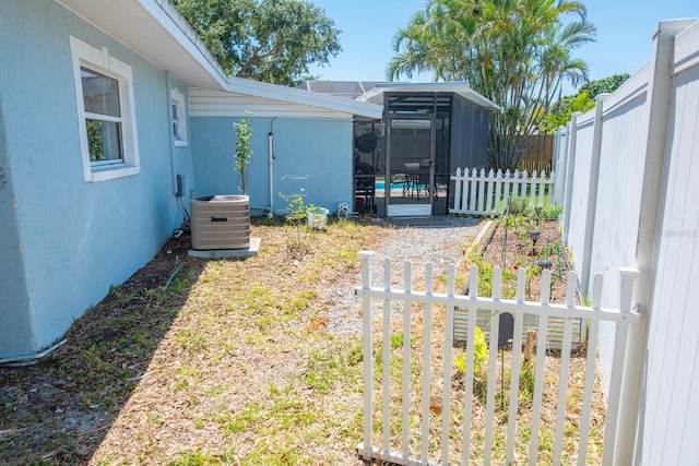 489 Fox Run Trl, Apollo Beach, FL 33572 - fenced yard featuring cooling unit