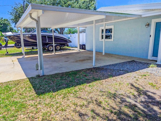 489 Fox Run Trl, Apollo Beach, FL 33572 - view of parking / parking lot with a carport