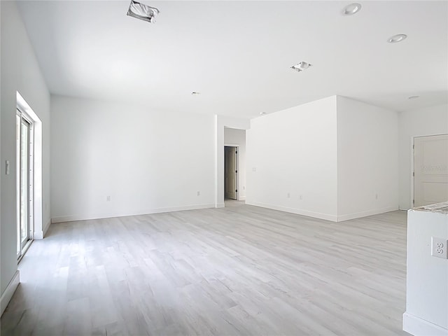 16134 Libourn Ave, Port Charlotte, FL 33954 - unfurnished room with light wood-style flooring and baseboards