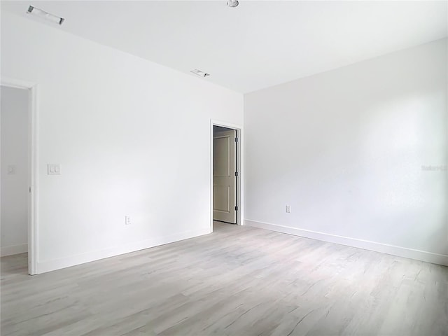 16134 Libourn Ave, Port Charlotte, FL 33954 - unfurnished room with light wood-type flooring and baseboards