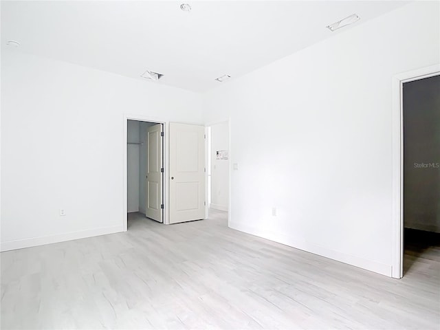 16134 Libourn Ave, Port Charlotte, FL 33954 - spare room with light wood-style flooring and baseboards