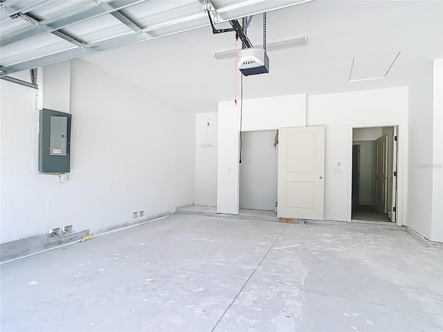 16134 Libourn Ave, Port Charlotte, FL 33954 - garage with electric panel and a garage door opener