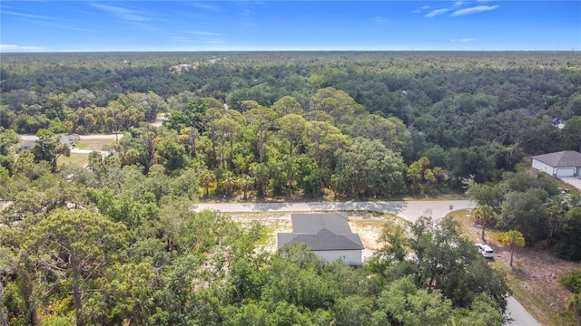 16134 Libourn Ave, Port Charlotte, FL 33954 - drone / aerial view of a heavily wooded area