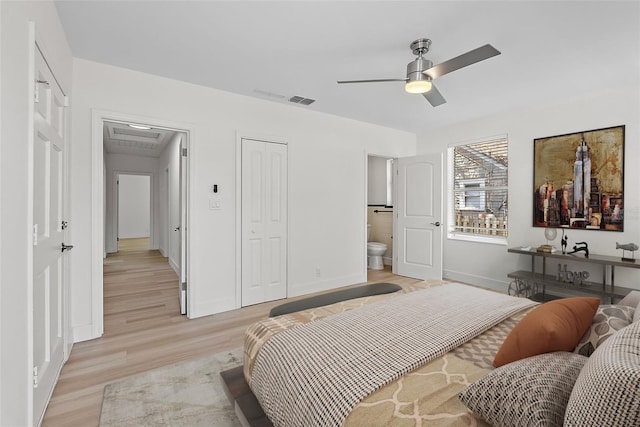 2449 16th St N, Saint Petersburg, FL 33704 - bedroom with baseboards, light wood-type flooring, ceiling fan, and a closet