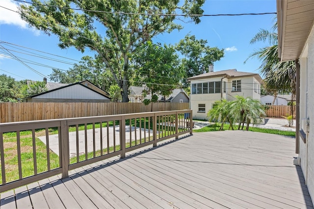 2449 16th St N, Saint Petersburg, FL 33704 - wooden terrace with a fenced backyard