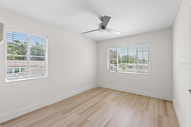 2449 16th St N, Saint Petersburg, FL 33704 - empty room with light wood-type flooring, baseboards, and ceiling fan