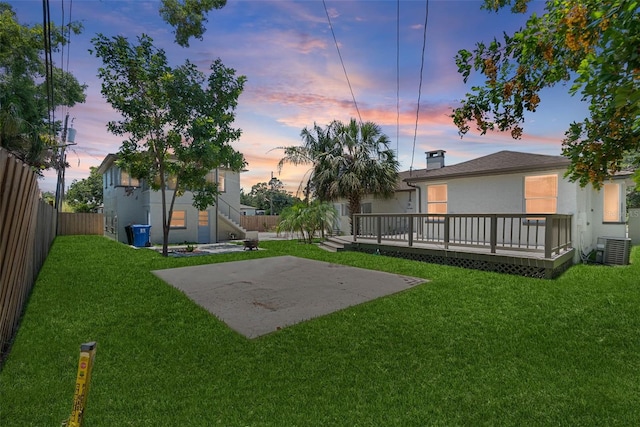 2449 16th St N, Saint Petersburg, FL 33704 - view of yard with cooling unit, a wooden deck, and a patio area