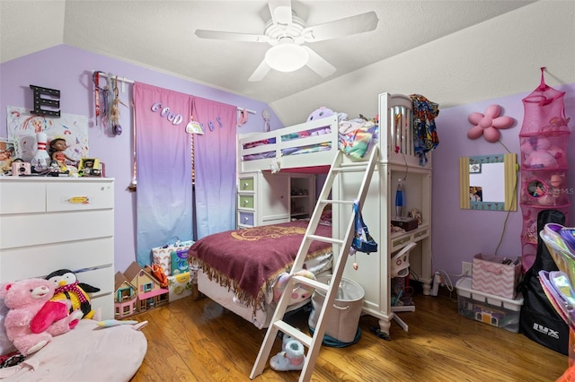717 E 137th Ave, Tampa, FL 33613 - bedroom featuring vaulted ceiling, wood finished floors, and a ceiling fan