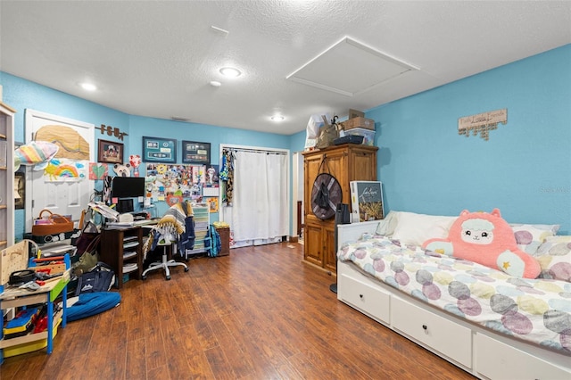 717 E 137th Ave, Tampa, FL 33613 - office area with attic access, wood finished floors, a textured ceiling, and recessed lighting
