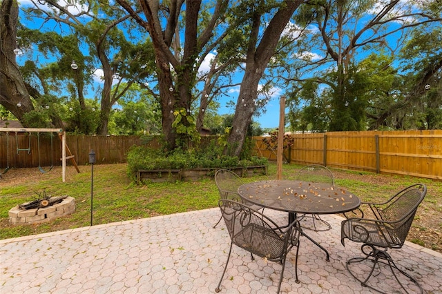 717 E 137th Ave, Tampa, FL 33613 - view of patio with a playground