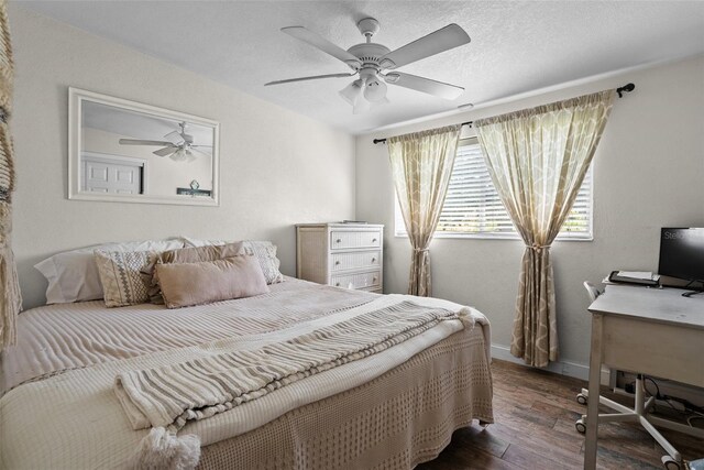 7304 Lakeside Blvd, Tampa, FL 33614 - bedroom featuring hardwood / wood-style flooring, a desk, baseboards, ceiling fan, and a textured ceiling