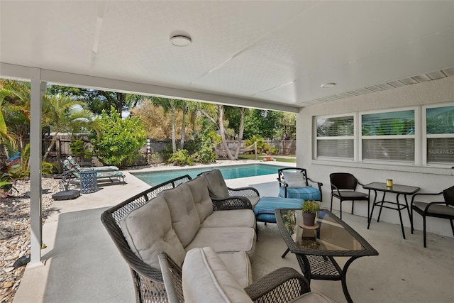 7304 Lakeside Blvd, Tampa, FL 33614 - fenced backyard with an outdoor living space and a patio area