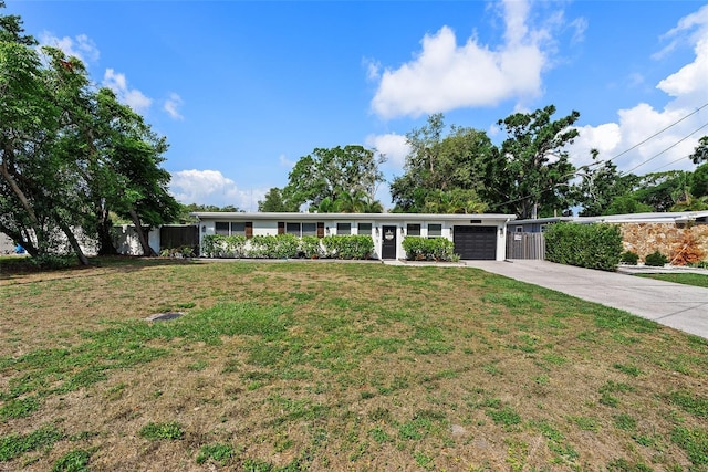 7304 Lakeside Blvd, Tampa, FL 33614 - single story home with driveway and a garage
