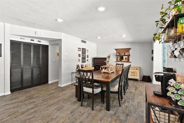 7304 Lakeside Blvd, Tampa, FL 33614 - dining space with wood finished floors, recessed lighting, and baseboards