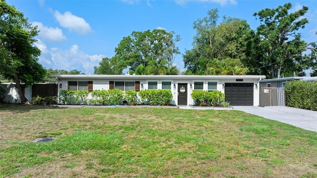 7304 Lakeside Blvd, Tampa, FL 33614 - view of front of property with a garage and driveway