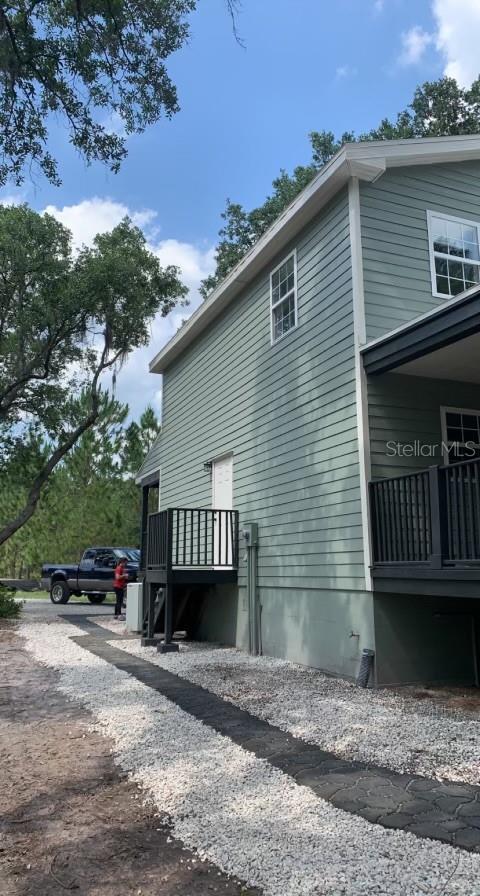 7152 Sandy Ln, Wesley Chapel, FL 33544 - view of side of home