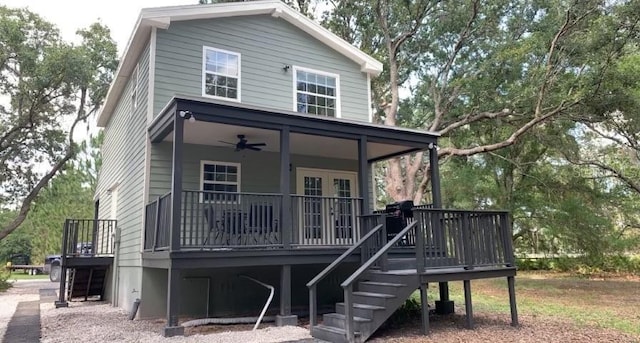 7152 Sandy Ln, Wesley Chapel, FL 33544 - view of front of house featuring ceiling fan, a deck, and stairway