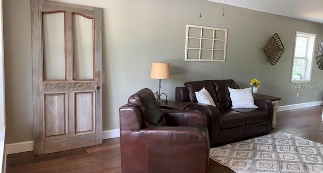 7152 Sandy Ln, Wesley Chapel, FL 33544 - living area with baseboards and wood finished floors